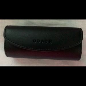 Black leather Coach lipstick case
